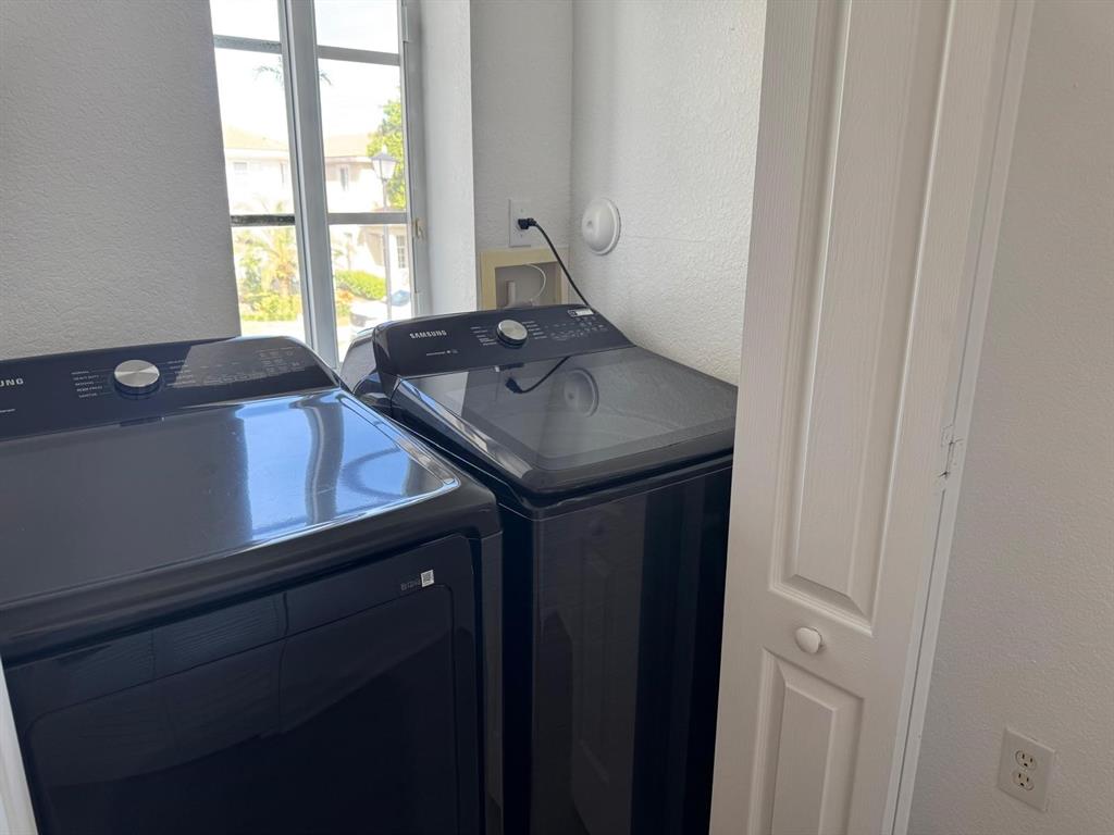 14044 Southwest 276th Way Homestead, FL 33032 - Photo 13 of 26 a kitchen with a sink and a window
