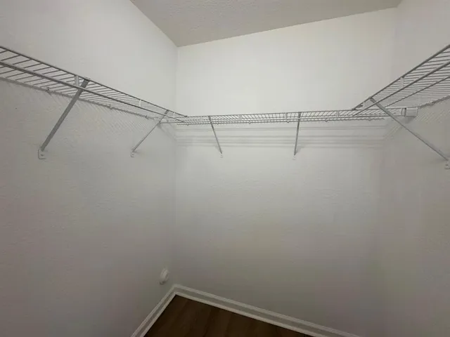 a view of a room with racks on the wall