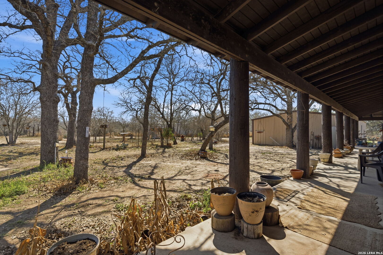 1150 Bruce Road Poteet, TX 78065 - Photo 27 of 33 a view of a patio with wooden floor