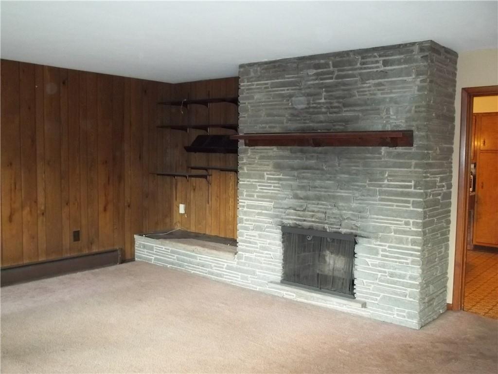 596 Wible Run Road Pittsburgh, PA 15209 - Photo 5 of 21 a view of empty room with a fireplace