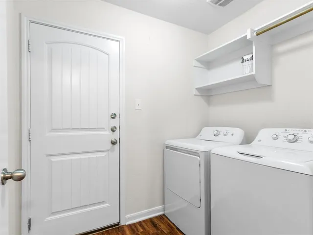 an empty room with closet area