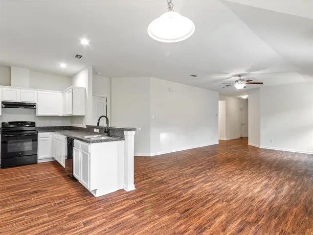 a view of a back yard of the house