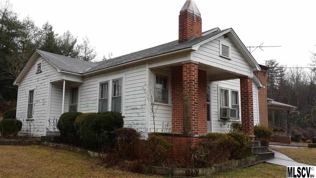 3407 Deerbrook Road Lenoir, NC 28645 - Photo 1 of 22 a view of a house with a yard