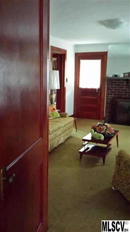 3407 Deerbrook Road Lenoir, NC 28645 - Photo 15 of 22 a room with a table and chairs