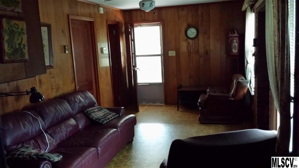 3407 Deerbrook Road Lenoir, NC 28645 - Photo 20 of 22 a living room with furniture and a window