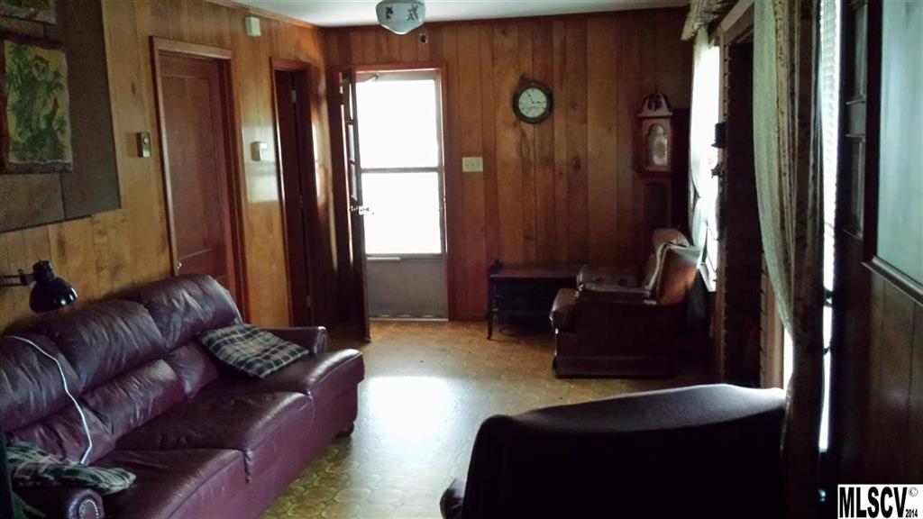 3407 Deerbrook Road Lenoir, NC 28645 - Photo 21 of 22 a living room with furniture and a window