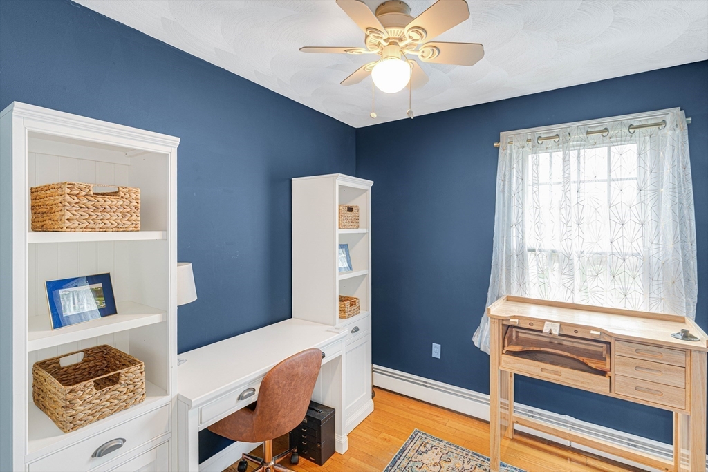 54 Old Merrill Street Amesbury, MA 01913 - Photo 27 of 34 a living room with furniture and a window