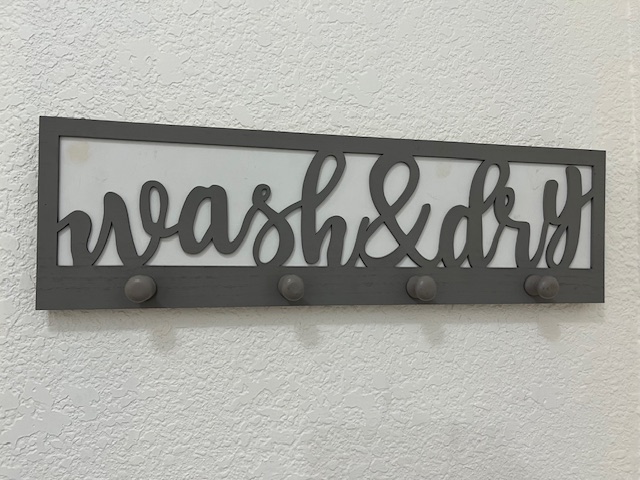 505 Ibis Falls Loop Jarrell, TX 76537 - Photo 27 of 29 a wall with a sign