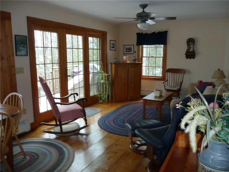50 Stack Em In Road Bridgton, ME 04009 - Photo 23 of 33 Living Room. OPEN LIVING,DINING AND...