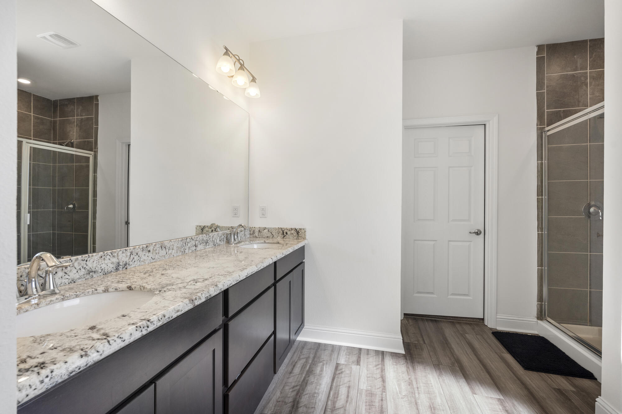 170 Double Eagle Court Freeport, FL 32439 - Photo 20 of 46 a bathroom with a sink and a mirror