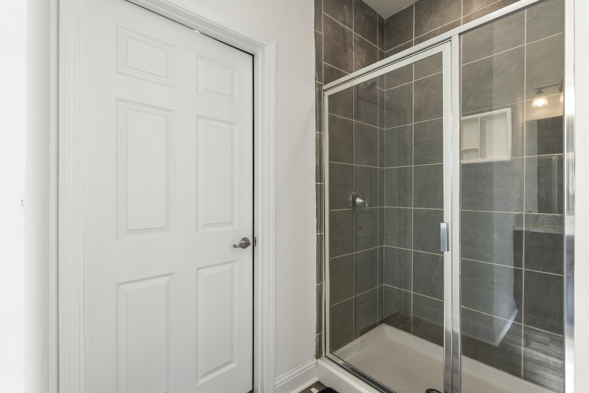 170 Double Eagle Court Freeport, FL 32439 - Photo 23 of 46 a bathroom with a shower