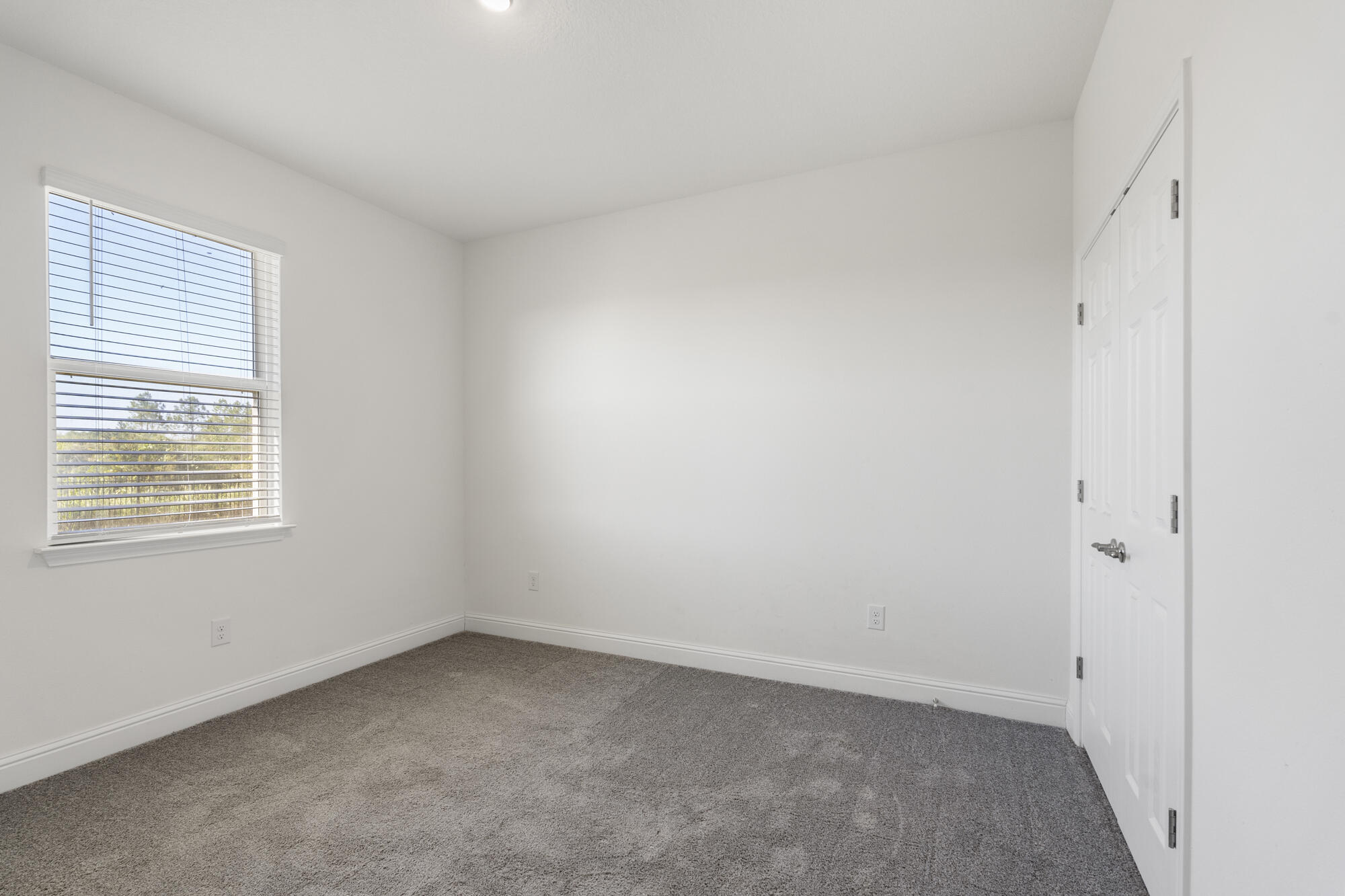 170 Double Eagle Court Freeport, FL 32439 - Photo 25 of 46 an empty room with a window