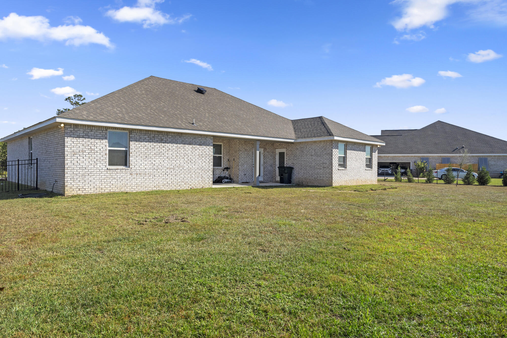 170 Double Eagle Court Freeport, FL 32439 - Photo 33 of 46 a front view of a house with a yard