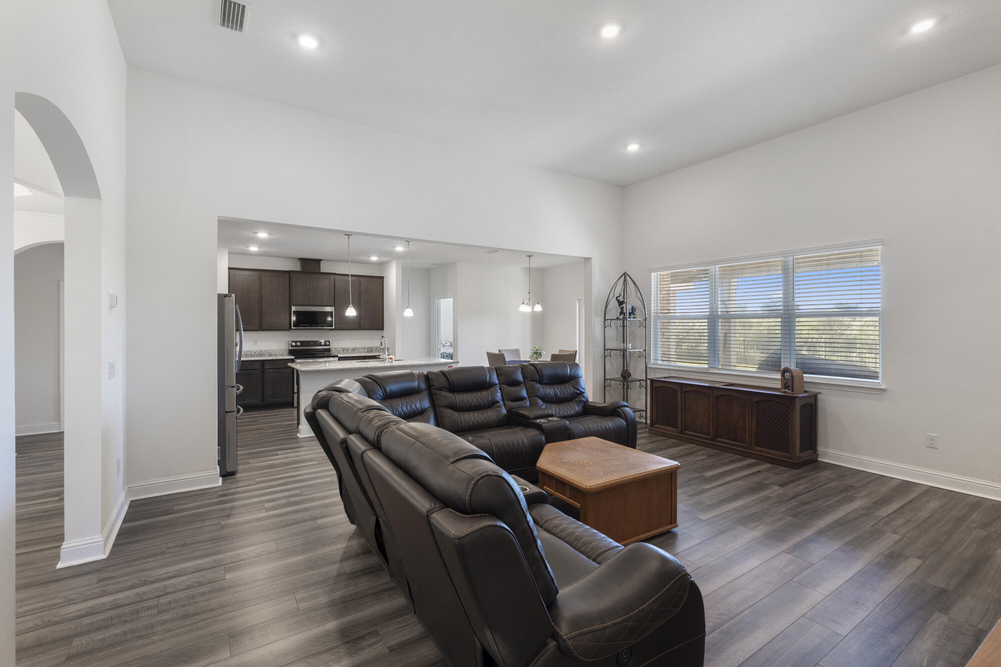 170 Double Eagle Court Freeport, FL 32439 - Photo 10 of 46 a living room with furniture and a wooden floor