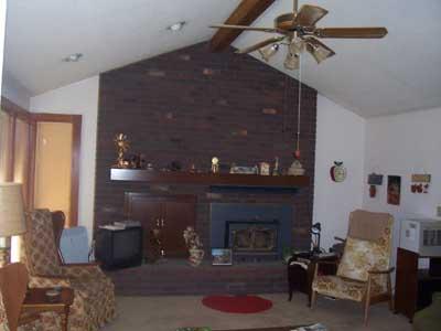 6510 Ashue Road Wapato, WA 98951 - Photo 2 of 18 a living room with furniture and a fireplace