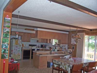 6510 Ashue Road Wapato, WA 98951 - Photo 3 of 18 a kitchen with stainless steel appliances a refrigerator and a stove top oven