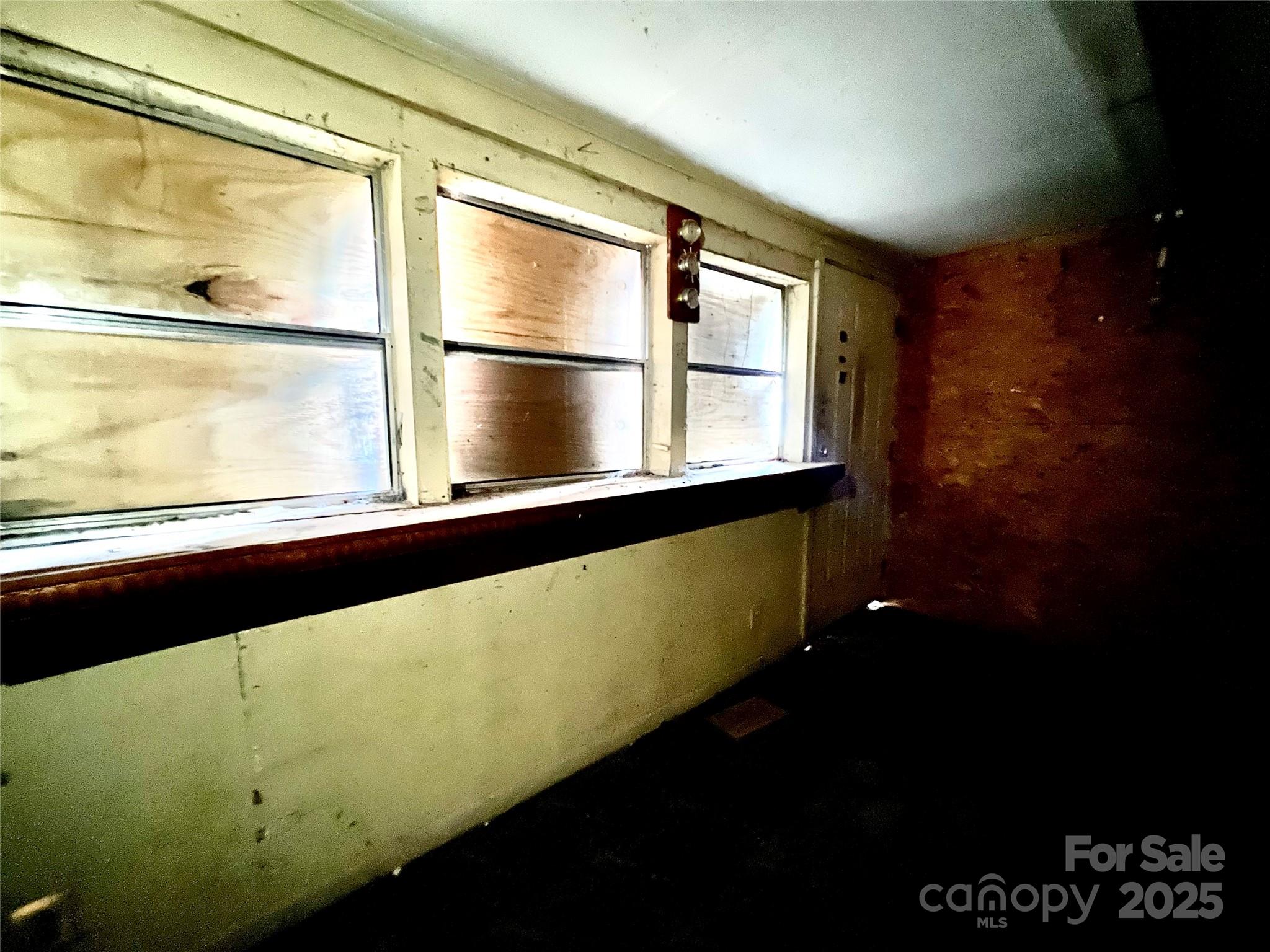 407 Chester Avenue Great Falls, SC 29055 - Photo 14 of 42 a view of a large window with wooden floor