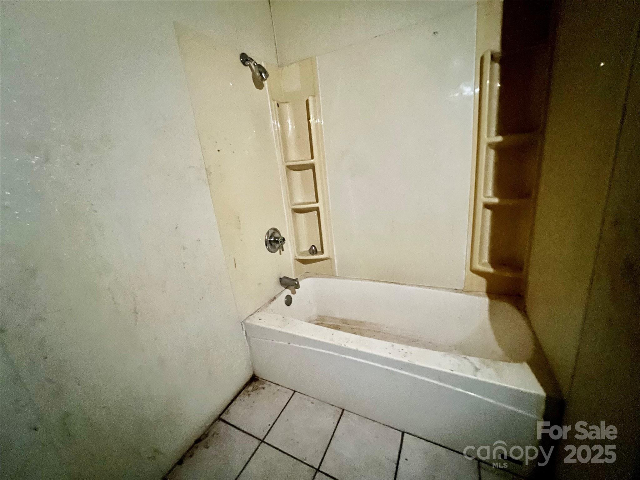 407 Chester Avenue Great Falls, SC 29055 - Photo 28 of 42 a white bath tub sitting next to a white toilet and sink
