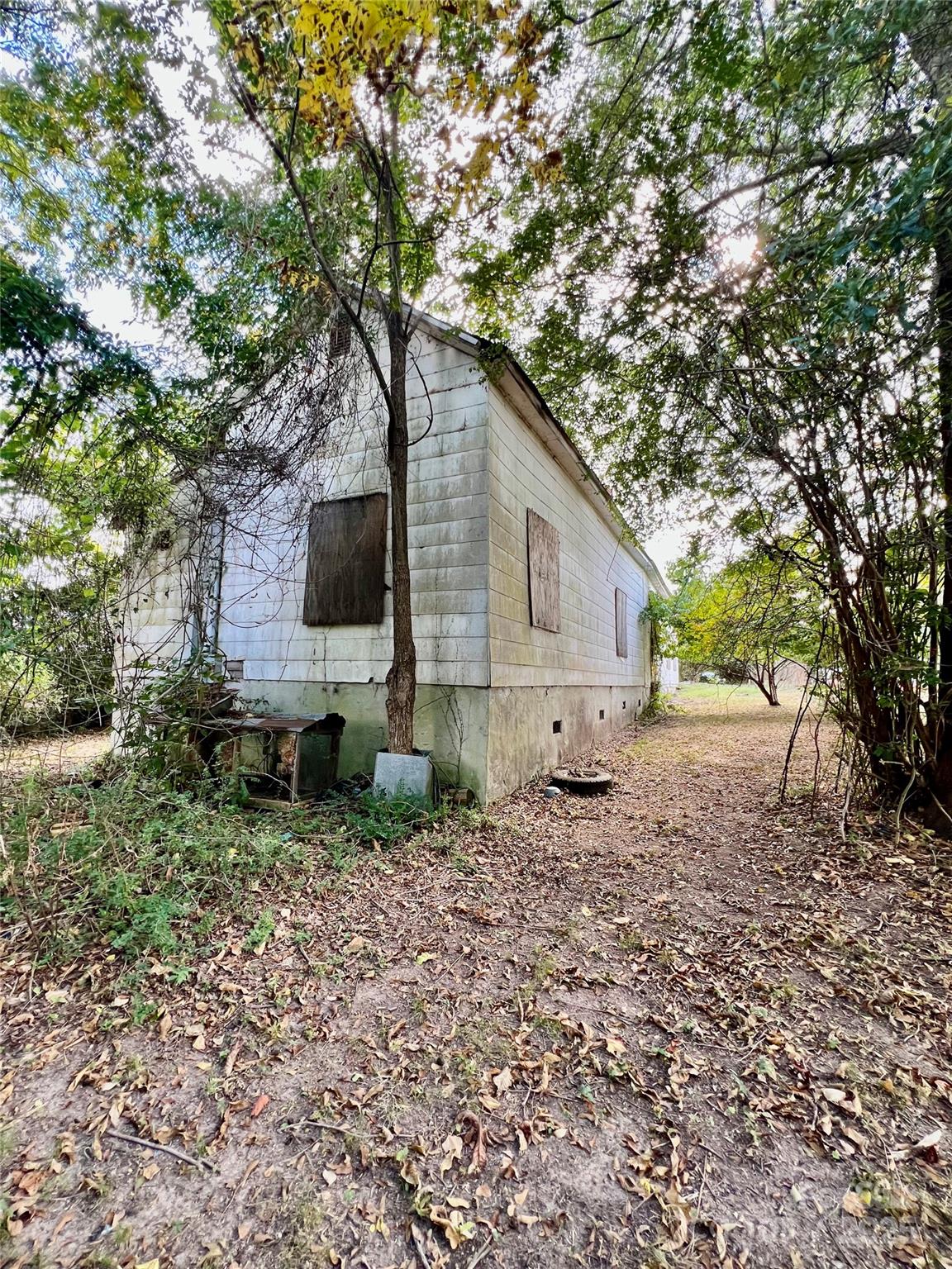 407 Chester Avenue Great Falls, SC 29055 - Photo 31 of 42 a backyard of a house with lots of green space