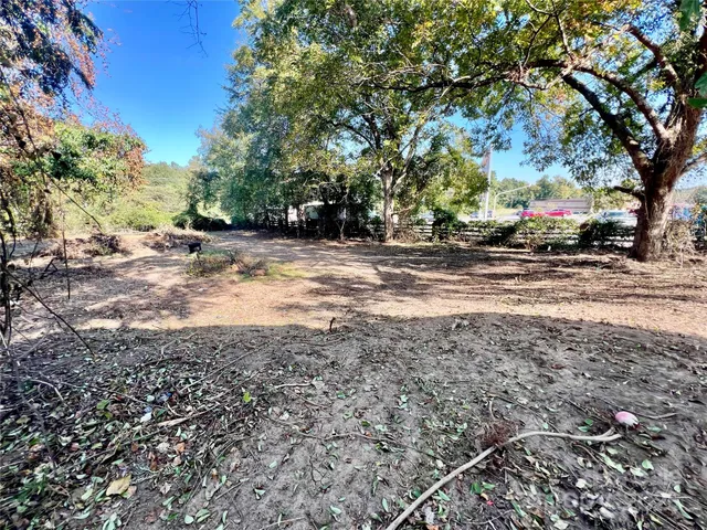 a view of road with trees