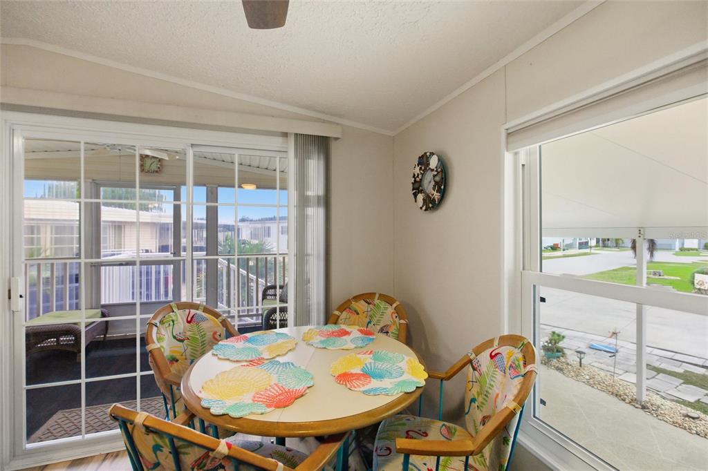 15 North Cardinal, Unit B15 Punta Gorda, FL 33950 - Photo 16 of 49 a view of a dining room with furniture and window