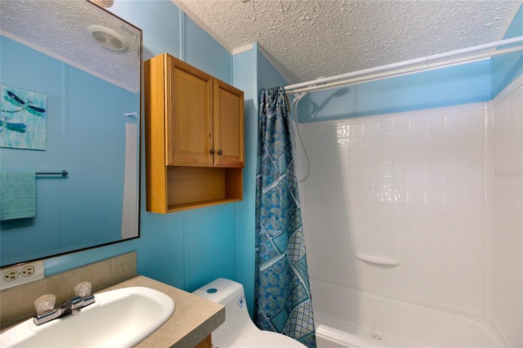15 North Cardinal, Unit B15 Punta Gorda, FL 33950 - Photo 26 of 49 a bathroom with a sink and a mirror