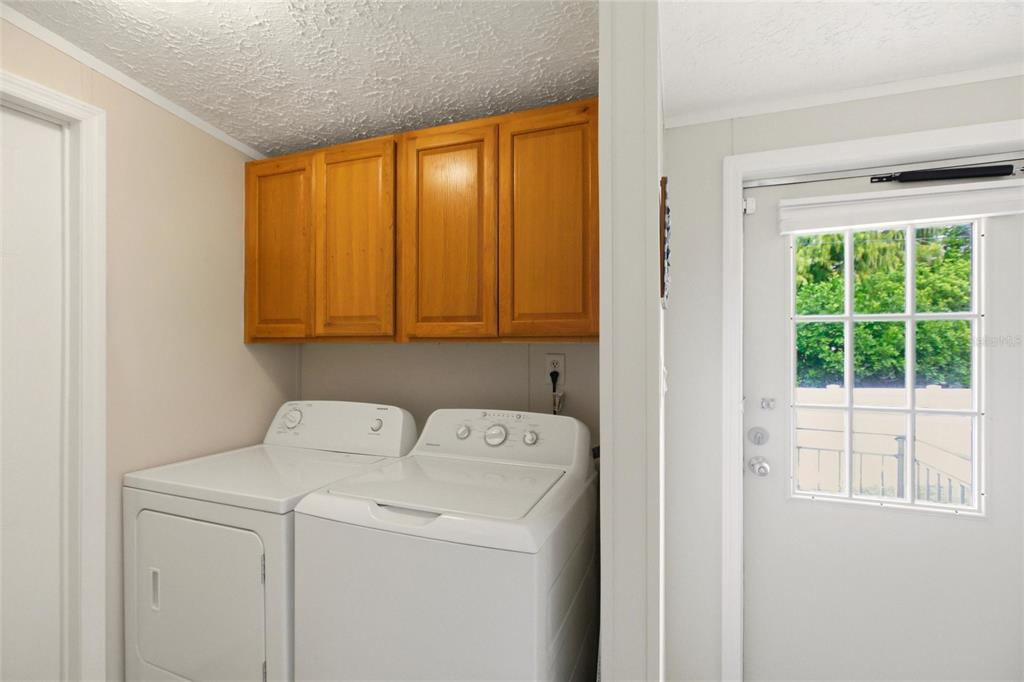 15 North Cardinal, Unit B15 Punta Gorda, FL 33950 - Photo 31 of 49 a utility room with dryer and washer