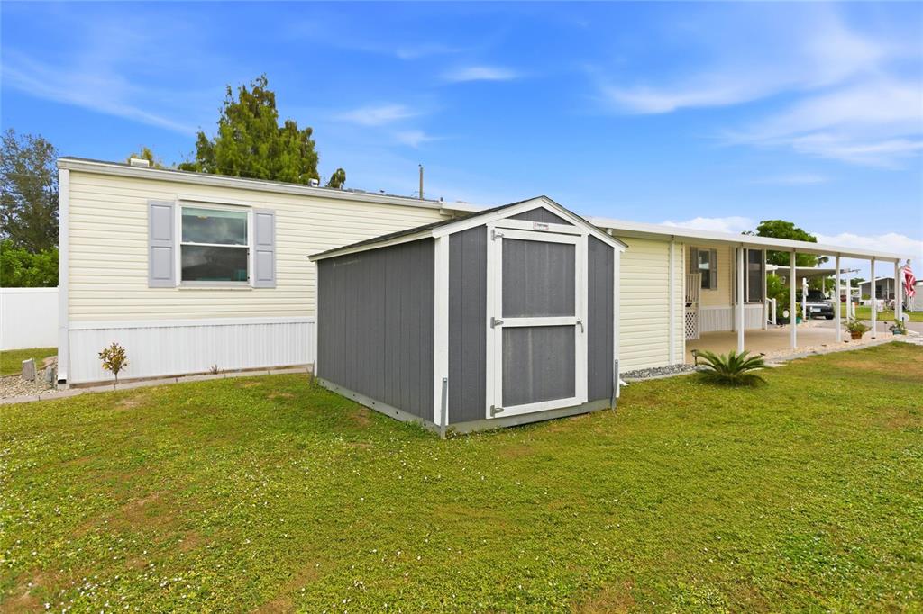 15 North Cardinal, Unit B15 Punta Gorda, FL 33950 - Photo 36 of 49 a view of a house with a yard