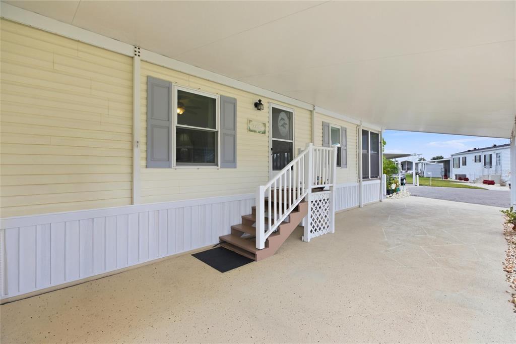 15 North Cardinal, Unit B15 Punta Gorda, FL 33950 - Photo 4 of 49 a view of a house with a porch