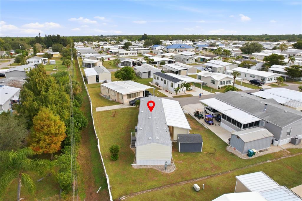 15 North Cardinal, Unit B15 Punta Gorda, FL 33950 - Photo 41 of 49 an aerial view of residential houses with outdoor space