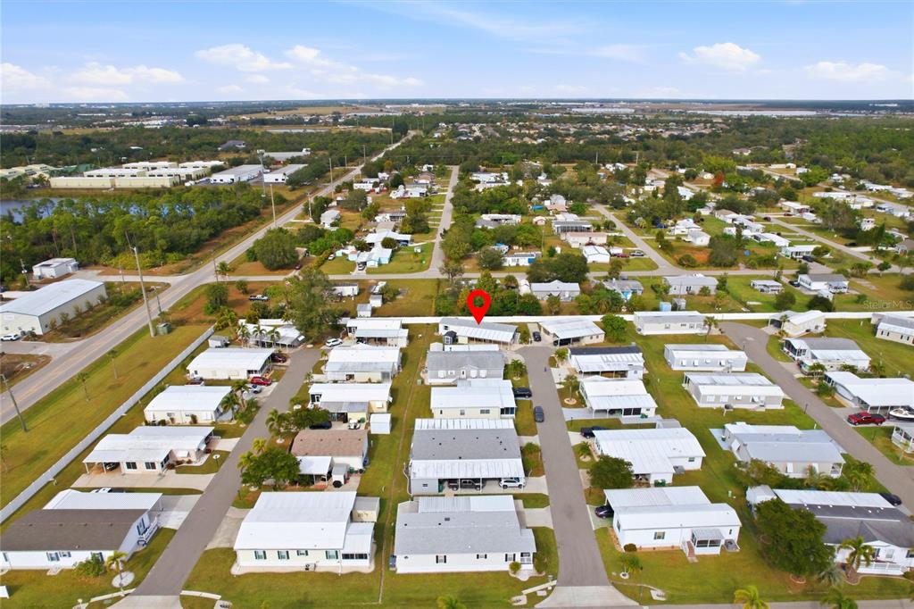 15 North Cardinal, Unit B15 Punta Gorda, FL 33950 - Photo 43 of 49 an aerial view of residential houses with outdoor space