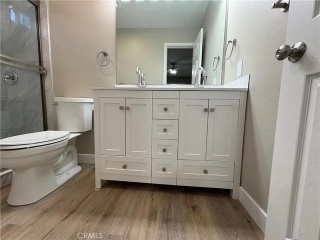 a bathroom with a sink and a toilet