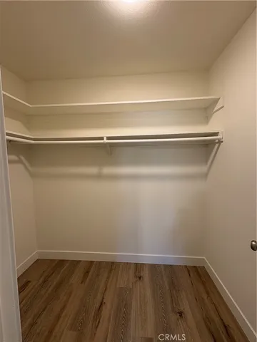 a view of an empty walk in closet