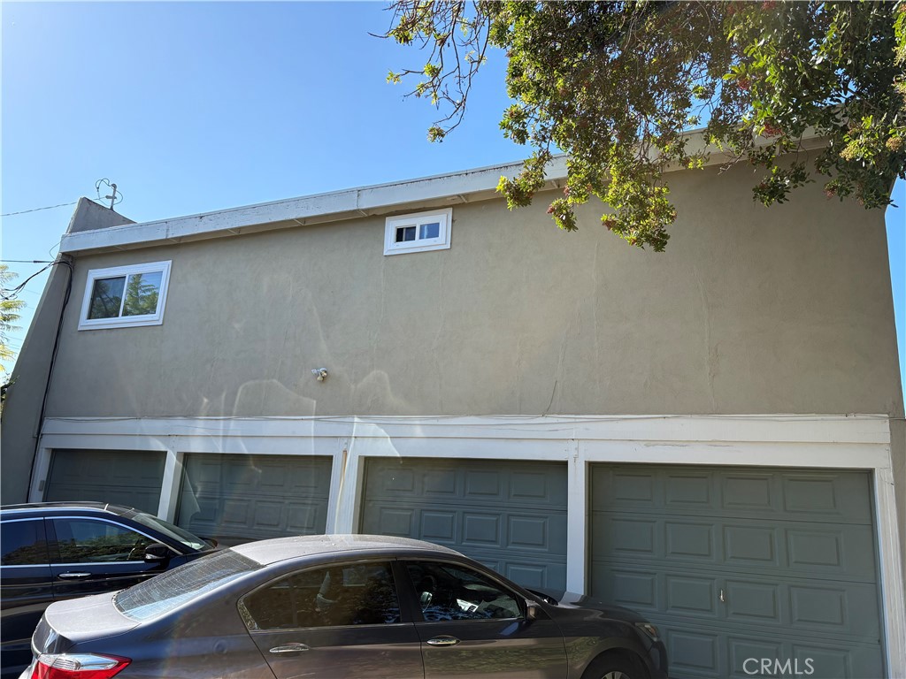 33972 El Encanto Avenue, Unit D Dana Point, CA 92629 - Photo 46 of 46 a car parked in front of a house