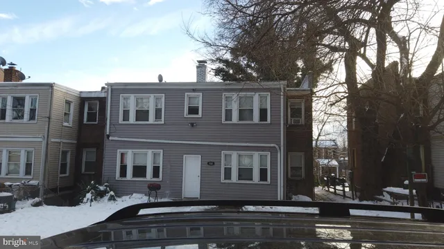a front view of a house with street