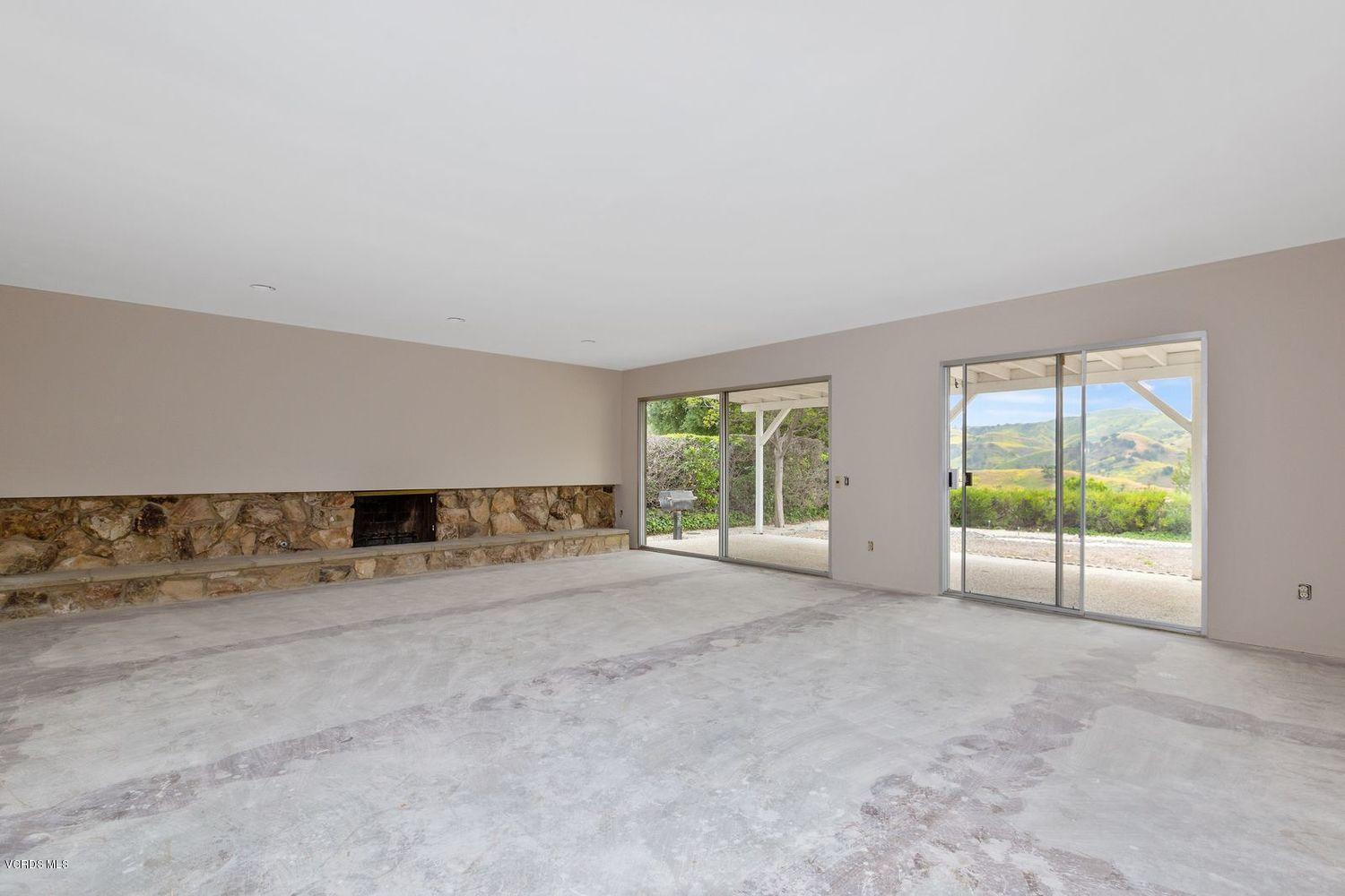 26003 Adamor Road Calabasas, CA 91302 - Photo 2 of 16 an empty room with windows