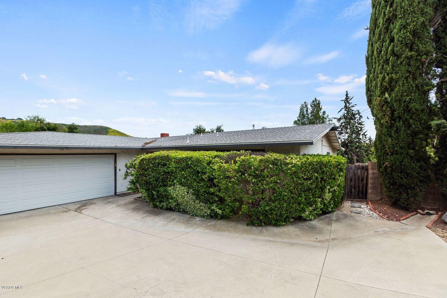 26003 Adamor Road Calabasas, CA 91302 - Photo 15 of 16 a front view of a house with a yard