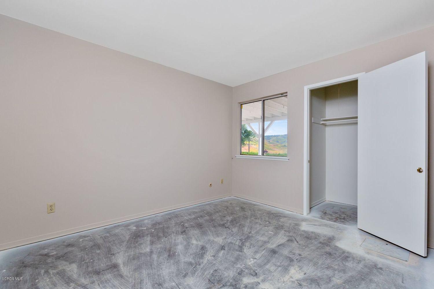 26003 Adamor Road Calabasas, CA 91302 - Photo 7 of 16 an empty room with windows and closet