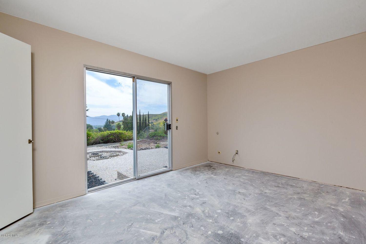 26003 Adamor Road Calabasas, CA 91302 - Photo 8 of 16 a view of an empty room with a balcony
