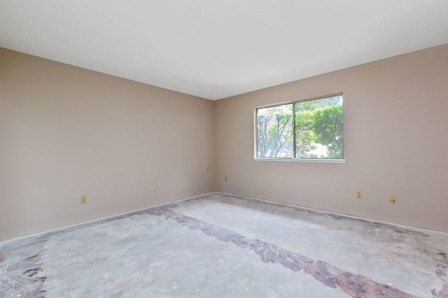 26003 Adamor Road Calabasas, CA 91302 - Photo 9 of 16 an empty room with windows