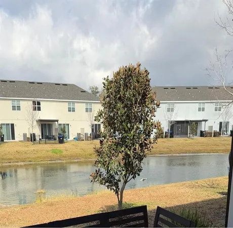 a view of swimming pool with outdoor seating