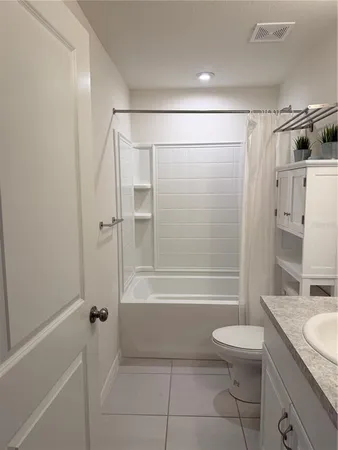 an empty room with cabinet