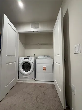 a bedroom with a bed and a desk