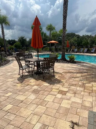 a view of outdoor space with furniture and garden