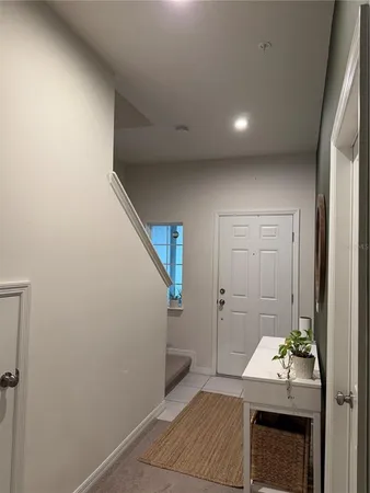 a hallway with storage and utility