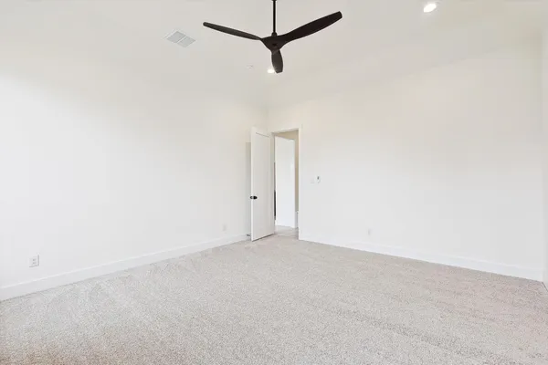a view of a room with a fan