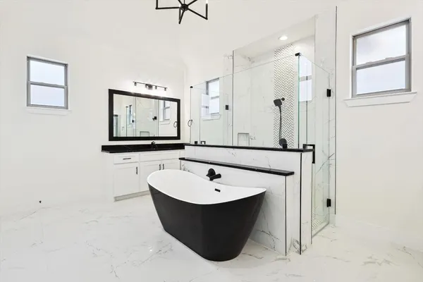 a bathroom with a sink and mirror