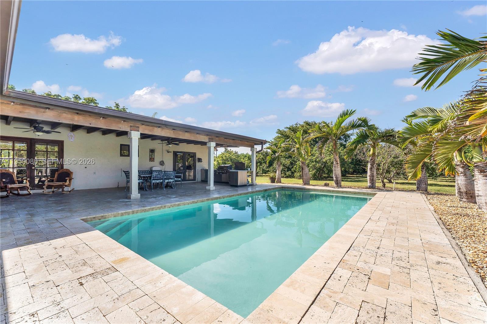 19225 Southwest 186th Street Miami, FL 33187 - Photo 24 of 42 a view of a backyard