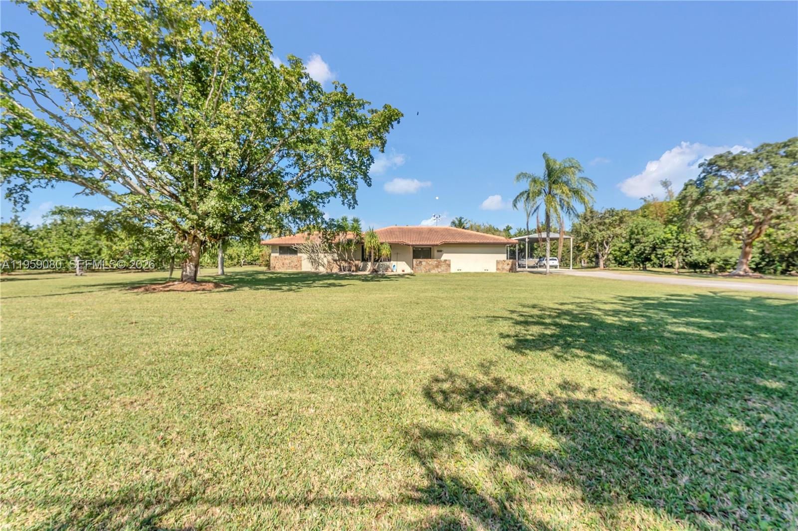 19225 Southwest 186th Street Miami, FL 33187 - Photo 40 of 42 a view of a yard with an outdoor space
