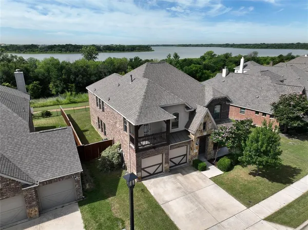 an aerial view of a house with garden